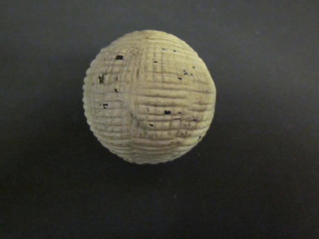 An Alex Patrick gutty golf ball circa late 1870s